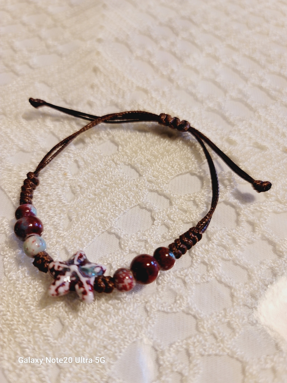 Adjustable Brown Beaded Bracelet with Red Star Charm